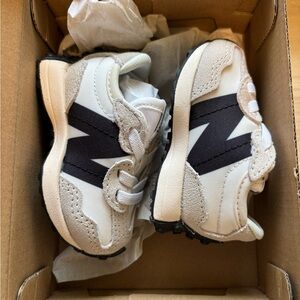 New Balance Kids Cream and Black Sneakers